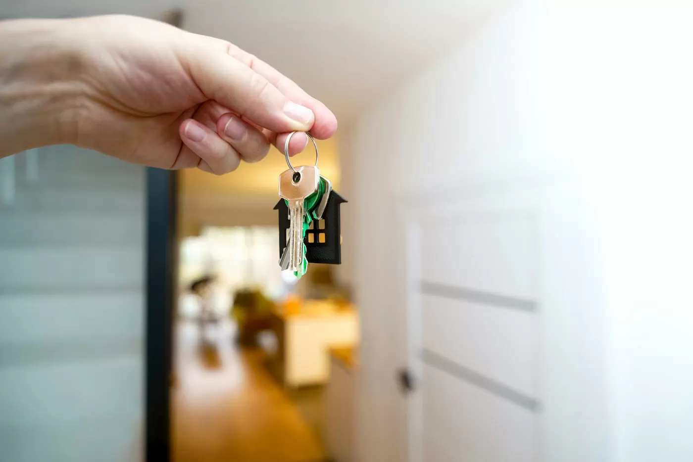 Remise des clés d'un logement à un voyageur